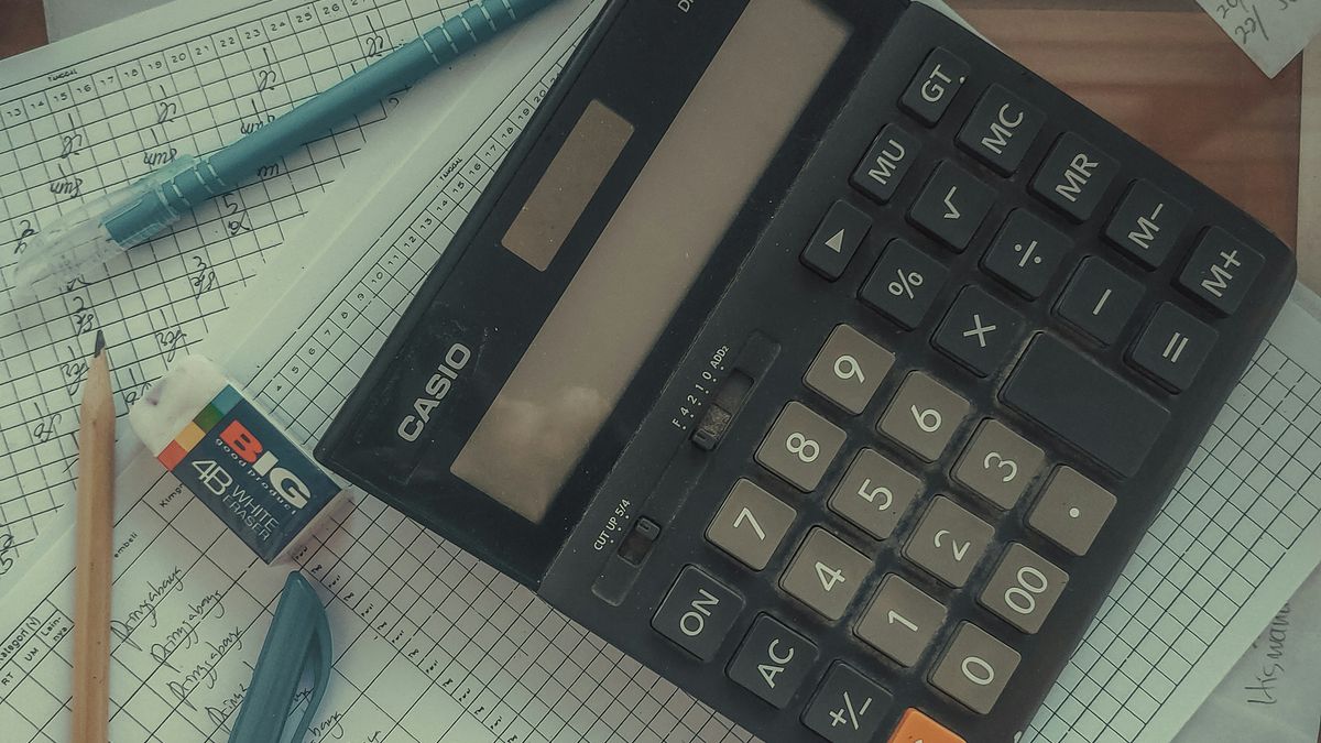 Calculator and financial paperwork