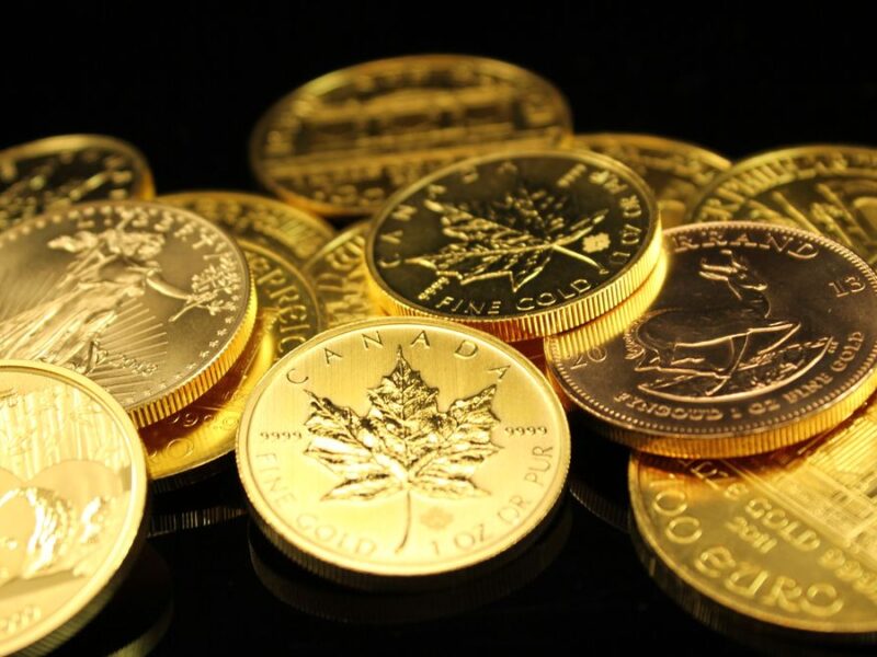 Gold bullion coins including Maple Leaf and Krugerrand