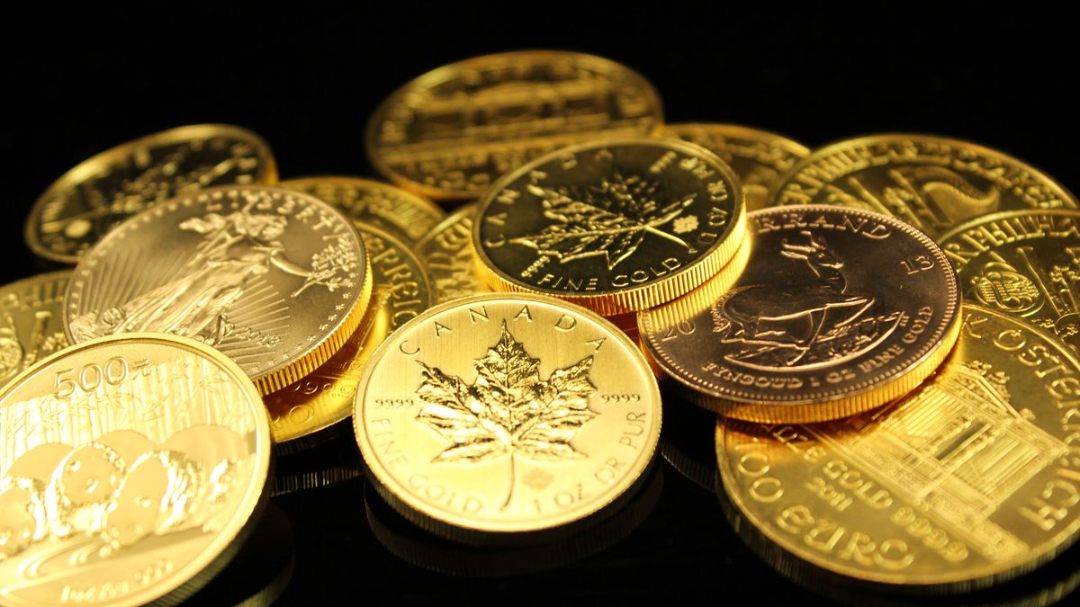 Gold bullion coins including Maple Leaf and Krugerrand