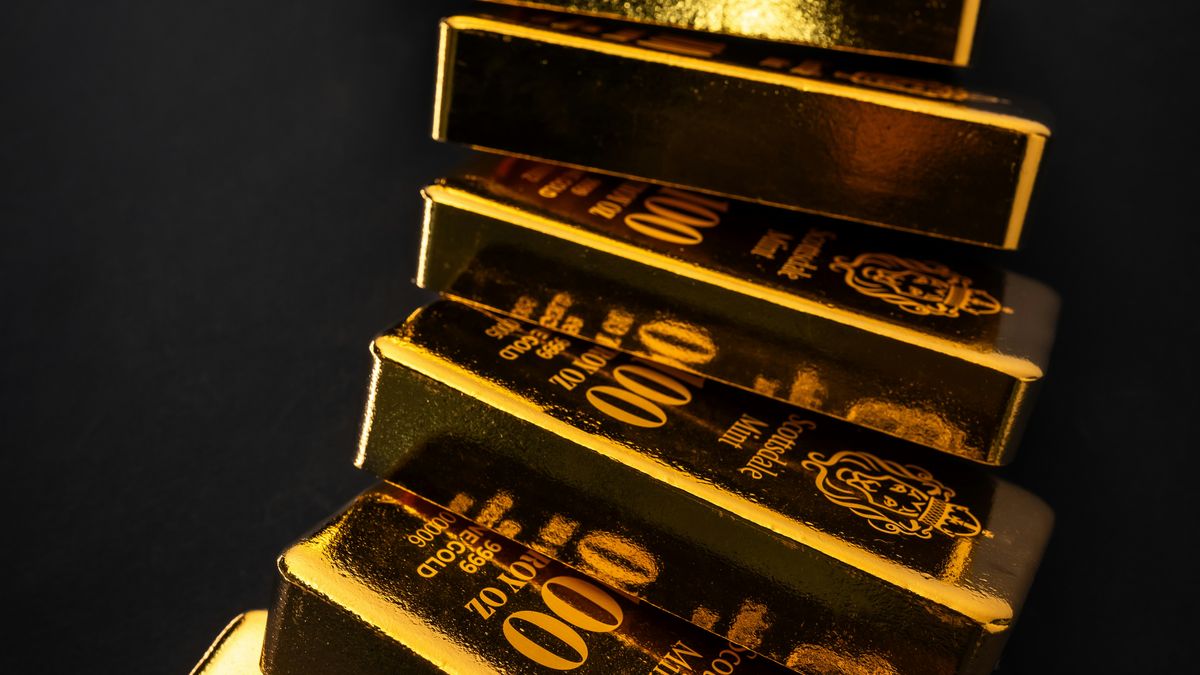 Tall stack of gold bars